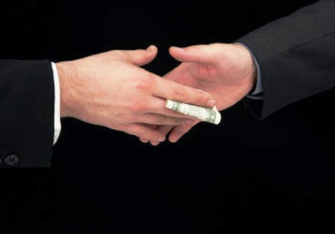 Transparency International: 'Ban State Officials from Engaging in Business Activities'