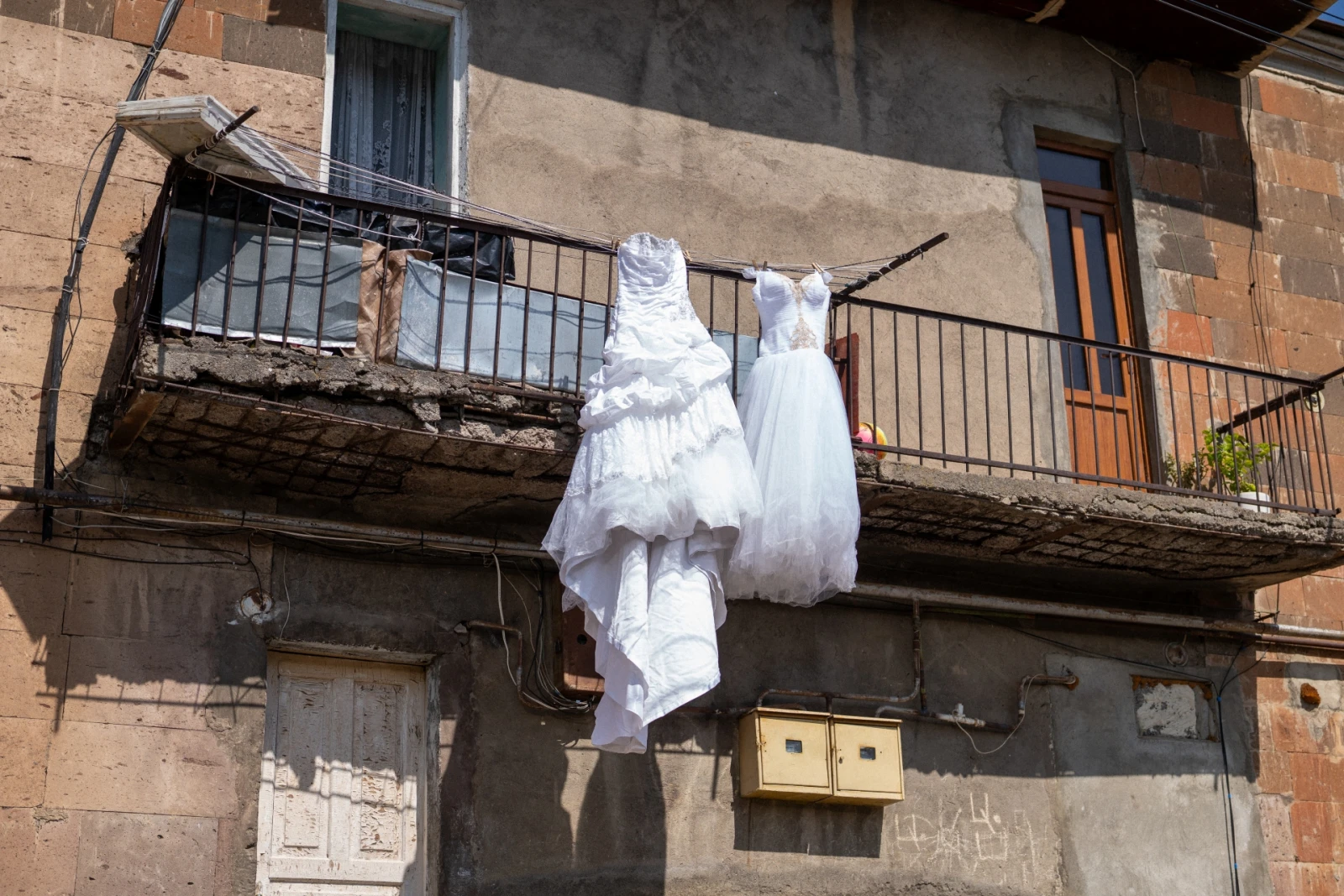 Wedding dresses on a balcony in Kechut
